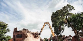 The 2014 demolition of Building 7 at the General Electric factory complex in downtown Peterborough captured by photographer Wayne Eardley as part of his "Caribou" series that was featured at the 2016 SPARK Photo Festival and the Art Gallery of Peterborough. Building 7 was part of the General Electric's armature department, which built coils for motors and generators, stators, DC motors, armatures, and more. (Photo: Wayne Eardley)
