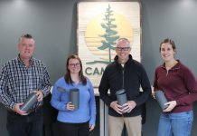 Cambium Consulting & Engineering staff show off their recycled plastic concrete molds. By turning their previously discarded plastic molds into reusable ones, the Peterborough firm is proving how businesses can lead the way in building a circular economy. From left to right: facilities and environmental health and safety manager Jeff Hoskin, technologist and green team representative Hillary Bradshaw, group manager for construction testing and inspection Brian Graham, and coordinator and green team representative Becky Yarnell. (Photo: Connor Evans / Cambium)