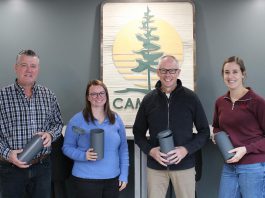 Cambium Consulting & Engineering staff show off their recycled plastic concrete molds. By turning their previously discarded plastic molds into reusable ones, the Peterborough firm is proving how businesses can lead the way in building a circular economy. From left to right: facilities and environmental health and safety manager Jeff Hoskin, technologist and green team representative Hillary Bradshaw, group manager for construction testing and inspection Brian Graham, and coordinator and green team representative Becky Yarnell. (Photo: Connor Evans / Cambium)