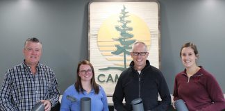 Cambium Consulting & Engineering staff show off their recycled plastic concrete molds. By turning their previously discarded plastic molds into reusable ones, the Peterborough firm is proving how businesses can lead the way in building a circular economy. From left to right: facilities and environmental health and safety manager Jeff Hoskin, technologist and green team representative Hillary Bradshaw, group manager for construction testing and inspection Brian Graham, and coordinator and green team representative Becky Yarnell. (Photo: Connor Evans / Cambium)