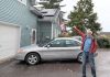 Lakefield resident Guy Hanchet proudly displays his newly installed solar panels. Despite not having an ideal rooftop for solar, he expects to power about half of his annual electricity use from the system. (Photo: Clara Blakelock / GreenUP)