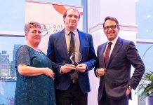Joel Wiebe (middle) receiving the James Gordon Carnegie Memorial Award from the Ontario Chamber of Commerce in April 2025. After almost five years with the Peterborough and Kawarthas Chamber of Commerce, including the past three as vice president of government relations and operations, Wiebe is leaving the chamber on October 3, 2025 to take on the role of senior advisor, community relations with Alto, Canada's first high-speed railway, which is currently under development. (Photo: Ontario Chamber of Commerce)