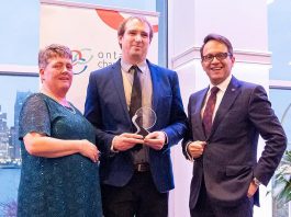 Joel Wiebe (middle) receiving the James Gordon Carnegie Memorial Award from the Ontario Chamber of Commerce in April 2025. After almost five years with the Peterborough and Kawarthas Chamber of Commerce, including the past three as vice president of government relations and operations, Wiebe is leaving the chamber on October 3, 2025 to take on the role of senior advisor, community relations with Alto, Canada's first high-speed railway, which is currently under development. (Photo: Ontario Chamber of Commerce)