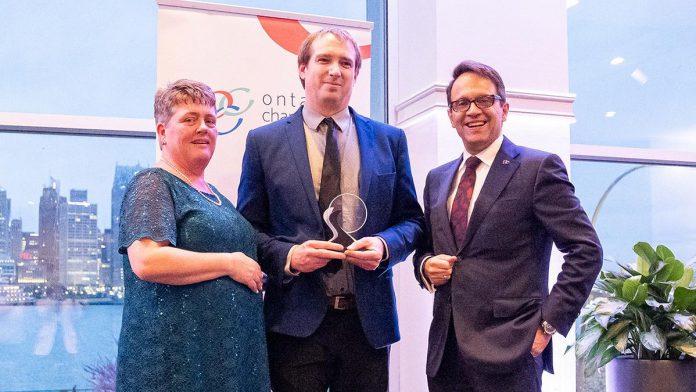 Joel Wiebe (middle) receiving the James Gordon Carnegie Memorial Award from the Ontario Chamber of Commerce in April 2025. After almost five years with the Peterborough and Kawarthas Chamber of Commerce, including the past three as vice president of government relations and operations, Wiebe is leaving the chamber on October 3, 2025 to take on the role of senior advisor, community relations with Alto, Canada's first high-speed railway, which is currently under development. (Photo: Ontario Chamber of Commerce)