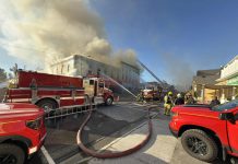 Smoke billows out of the historic building housing Kawartha Home Hardware at 24 Queen Street in downtown Lakefield on October 9, 2025. (Photo: Mike Quigg)