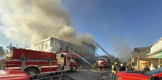Smoke billows out of the historic building housing Kawartha Home Hardware at 24 Queen Street in downtown Lakefield on October 9, 2025. (Photo: Mike Quigg)