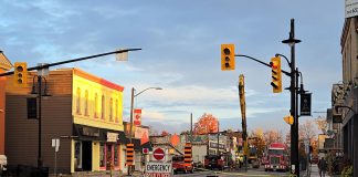 Queen Street in downtown Lakefield is scheduled to reopen at 8 a.m. on October 24, 2025, as demolition work of the fire-ravaged Kawartha Home Hardware building no longer requires the street to remain closed. The demolition site at 24 Queen Street will remain fenced off, with a temporary pedestrian walkway installed in front of the site. (Photo: Selwyn Township)