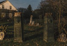 Take a stroll through the graveyard if you dare while visiting Lang Pioneer Village Museum in Keene for Spooky All Hallows' Eve from 6 to 9 p.m. on October 24 and 25, 2025. The family-friendly event offers a wide range of fun activities along with stories about the origin of modern-day Halloween traditions. (Photo: Heather Doughty Photography / Lang Pioneer Village Museum)