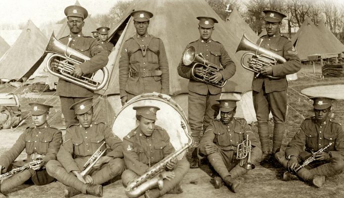 Written and performed by brothers Beau and Lance Dixon, "Footnote to Freedom" is a musical about their grandfather George Dixon (front, second from left), a private and cornet player in the band of No. 2 Construction Battalion, Canada's only segregated Black Battalion in World War I. The musical is based on Lance's memoir "A Footnote to Freedom: Reclaiming the Life and Legacy of a Black Soldier," to be released in February 2026. (Photo courtesy of Black Cultural Centre for Nova Scotia)