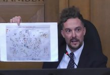 Peterborough city councillor Alex Bierk displays an "intake clinic hazard map," from a 2017 Unifor report detailing the toxic chemical exposures at the General Electric site between 1945 and 2000, during a general committee meeting on October 6, 2025 when council considered a notice of demolition of a large number of vacant buildings at the historic factory complex at 107 Park Street North. (kawarthaNOW screenshot of City of Peterborough video)
