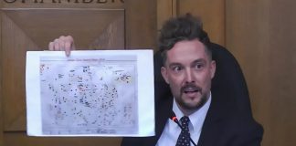 Peterborough city councillor Alex Bierk displays an "intake clinic hazard map," from a 2017 Unifor report detailing the toxic chemical exposures at the General Electric site between 1945 and 2000, during a general committee meeting on October 6, 2025 when council considered a notice of demolition of a large number of vacant buildings at the historic factory complex at 107 Park Street North. (kawarthaNOW screenshot of City of Peterborough video)