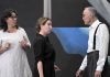 Lisa Dixon (left) directs Gayle Fraser and David Russell during a rehearsal for the Peterborough Theatre Guild's production of "291" by Jade O'Keeffe, Dixon's daughter. The play, which tells the love story of American modernist painter and draftswoman Georgia O'Keeffe and American photographer and modern art promoter Alfred Stieglitz, runs for nine performances from November 1 to 15, 2025. (kawarthaNOW screenshot of Peterborough Theatre Guild video)