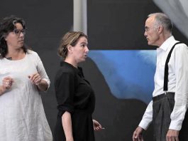 Lisa Dixon (left) directs Gayle Fraser and David Russell during a rehearsal for the Peterborough Theatre Guild's production of "291" by Jade O'Keeffe, Dixon's daughter. The play, which tells the love story of American modernist painter and draftswoman Georgia O'Keeffe and American photographer and modern art promoter Alfred Stieglitz, runs for nine performances from November 1 to 15, 2025. (kawarthaNOW screenshot of Peterborough Theatre Guild video)