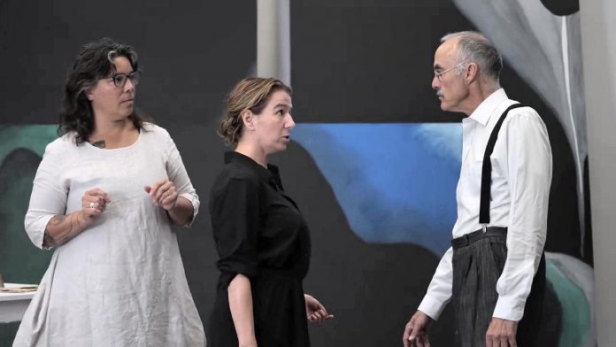 Lisa Dixon (left) directs Gayle Fraser and David Russell during a rehearsal for the Peterborough Theatre Guild's production of "291" by Jade O'Keeffe, Dixon's daughter. The play, which tells the love story of American modernist painter and draftswoman Georgia O'Keeffe and American photographer and modern art promoter Alfred Stieglitz, runs for nine performances from November 1 to 15, 2025. (kawarthaNOW screenshot of Peterborough Theatre Guild video) Lisa Dixon (left) directs Gayle Fraser and David Russell during a rehearsal for the Peterborough Theatre Guild's production of "291" by Jade O'Keeffe, Dixon's daughter. The play, which tells the love story of American modernist painter and draftswoman Georgia O'Keeffe and American photographer and modern art promoter Alfred Stieglitz, runs for nine performances from November 1 to 15, 2025. (kawarthaNOW screenshot of Peterborough Theatre Guild video)