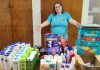 Rose Wilton, founder and CAO of The Rose Quest, in October 2024 with a donation of personal hygiene products for Kinark Child and Family Services. As the next step of the personal care initiative she founded in 2014, which became a non-profit organization in 2020 and a registered charity in 2024, Wilton's organization is raising $200,000 to create Ontario's first community-focused hygiene centre for those in need. The organization expects to provide 25,000 essential hygiene items to more than 2,000 people annually. (Photo: The Rose Quest / Facebook)