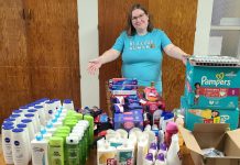 Rose Wilton, founder and CAO of The Rose Quest, in October 2024 with a donation of personal hygiene products for Kinark Child and Family Services. As the next step of the personal care initiative she founded in 2014, which became a non-profit organization in 2020 and a registered charity in 2024, Wilton's organization is raising $200,000 to create Ontario's first community-focused hygiene centre for those in need. The organization expects to provide 25,000 essential hygiene items to more than 2,000 people annually. (Photo: The Rose Quest / Facebook)