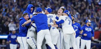 The Toronto Blue Jays celebrate after defeating the Seattle Mariners on October 20, 2025 to win the American League pennant, sending them to the World Series for the first time in 32 years. (Photo: Major League Baseball)