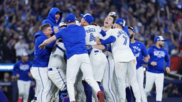 The Toronto Blue Jays celebrate after defeating the Seattle Mariners on October 20, 2025 to win the American League pennant, sending them to the World Series for the first time in 32 years. (Photo: Major League Baseball) The Toronto Blue Jays celebrate after defeating the Seattle Mariners on October 20, 2025 to win the American League pennant, sending them to the World Series for the first time in 32 years. (Photo: Major League Baseball)