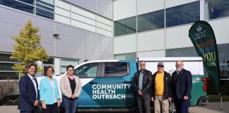 Trent/Fleming School of Nursing dean Dr. Hugo Lehmann and associate dean Dr. Ellen Buck-McFadyen, nurse practitioner and Trent University clinical instructor Erinne Stevens, donors Brad Holland and Bryan Davies, and Trent University provost and vice-president Dr. Mark Skinner in front of the new donor-funded community health outreach vehicle that the Peterborough Community Health Centre will use to improve primary healthcare services to rural and Indigenous communities in Peterborough County while also providing nursing students with practical experience. (Photo courtesy of Trent University)