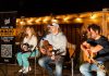 Founded by Waterloo native and Billboard-charting and award-winning artist Scotty James (middle), Backyard Music Co. is bringing Nashville-style intimate concerts to 13 locations across Canada in 2026, including Bobcaygeon and Fenelon Falls in Kawartha Lakes. (Photo: Backyard Music Co.)