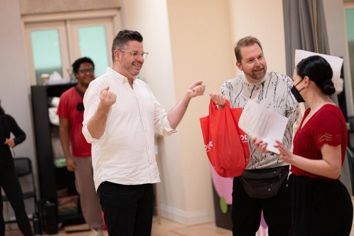 Capitol Theatre artistic director Rob Kempson (middle) directing a recent rehearsal of "Hansel & Gretel - The Sticky and Sweet Panto," which he also wrote. The holiday musical comedy runs for 45 performances from November 21 to December 28, 2025 at the historic venue in downtown Port Hope. (Photo: Sam Moffatt)