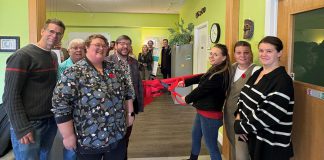 Peer-led program launches in Haliburton County to support people with substance use and mental health challenges Point in Time executive director Marg Cox (second from left) and Canadian Mental Health Association Haliburton, Kawartha, Pine Ridge (CMHA HKPR) program supervisor David Bradley (fourth from left) along with peer specialists cut the ribbon for "Coming Full Circle" at 83 Maple Avenue in Haliburton on November 4, 2025. Funded by Health Canada, the two-year initiative is designed to help people with mental health and addiction challenges succeed by building a network of trained and mentored workers who have lived experience. (Photo: CMHA HKPR)