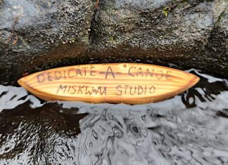 Daniel Marlatt, an elemental artist at Miskwaa Art Studio and Outdoor Gallery in Trent Lakes, has announced his free "Dedicate a Canoe" project inviting community members to dedicate a six-inch canoe handcarved by the artist to a loved one and send it down the Miskwaa Ziibi river at Marlatt's studio in spring 2026. The free-of-charge project is inspired by the similar "lil Red Canoe" project and blog that Marlatt launched in 2019. (Photo courtesy of Daniel Marlatt)