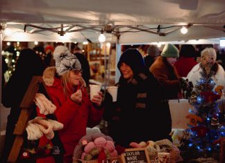 First Friday Holiday Night Market returns to downtown Peterborough on December 5 The Neighbourhood Vintage and First Friday Peterborough are teaming up once again to host the fourth annual Holiday Night Market, held in the Bankers Commons Courtyard off Water Street in downtown Peterborough on December 5, 2025. The outdoor market will feature 24 local artisans and makers selling art and homemade goods, as well as live music from five local musicians, and holiday treats and drinks from five downtown restaurants. (Photo: Luke Best)