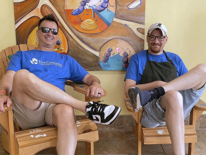 Jordie Barrie (right) believes in giving back to his community, which is why he is quick to volunteer and assist at different fundraising events that support Five Counties Children's Centre. He often be found chumming around with his buddy, Pete Dalliday, as was the case when the two assisted this past June at the Backyard Summer Social fundraising event in support of Five Counties. (Photo courtesy of Five Counties Children's Centre)