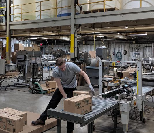 Inside Charlotte Products' Peterborough facility, staff oversee the packaging of environmentally responsible cleaning products. The company uses a supply chain that emphasizes Ontario-based materials and partnerships to minimize emissions and cost. (Photo courtesy of Charlotte Products)