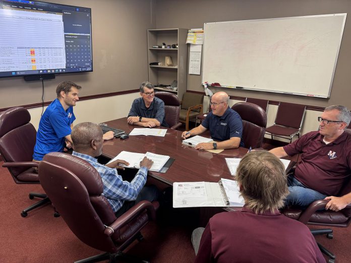 Partnering with local businesses builds relationships, cuts transportation costs, and enables quick and meaningful response time. Here, Charlotte Products and Merit Precision Moulding collaborate on their latest project. (Photo courtesy of Charlotte Products)