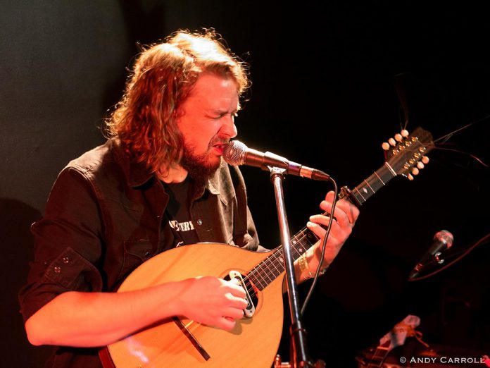Singer-songwriter and multi-instrumentalist Benj Rowland, pictured performing during the debut episode of Trent Radio's "Radio from the Stage" live radio broadcast series at The Theatre On King in downtown Peterborough on October 29, 2023, will be the special musical guest at the 2025 In From The Cold concert at Market Hall Performing Arts Centre in downtown Peterborough on Friday, December 5 and Saturday, December 6. (Photo: Andy Carroll)
