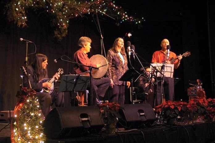 Michael Ketemer and Carried Away (Rob Fortin, Susan Newman, and John Hoffman) performing 21 years ago at the 2004 In From The Cold concert at Market Hall Performing Arts Centre in downtown Peterborough. (Photo: Jeannine Taylor / kawarthaNOW)