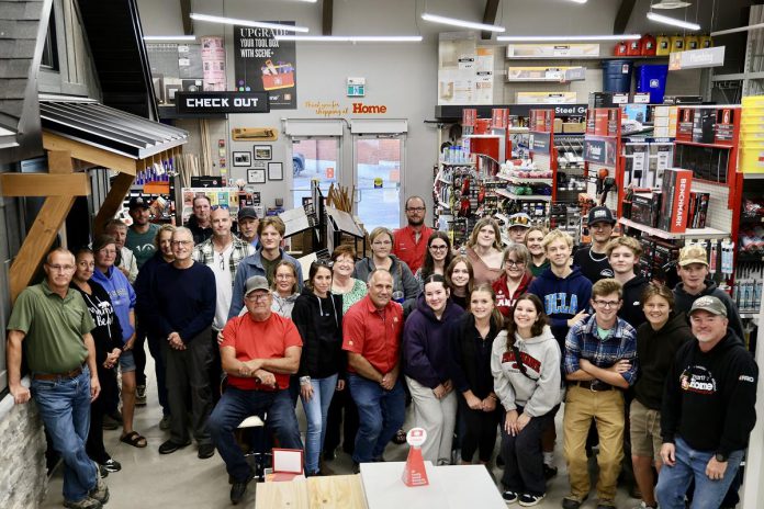 Kawartha Home Hardware Group of Stores general manager Frank Geerslink (front, far left) with employees of Kawartha Home Hardware during happier times, before a fire destroyed the historic building at the corner of Queen and Burnham streets in downtown Lakefield on October 9, 2025. Geerslink says Kawartha Home Hardware will be opening a pop-up store at 25 Queen Street, just across the street, before Christmas. (Photo: Kawartha Home Hardware / Facebook)