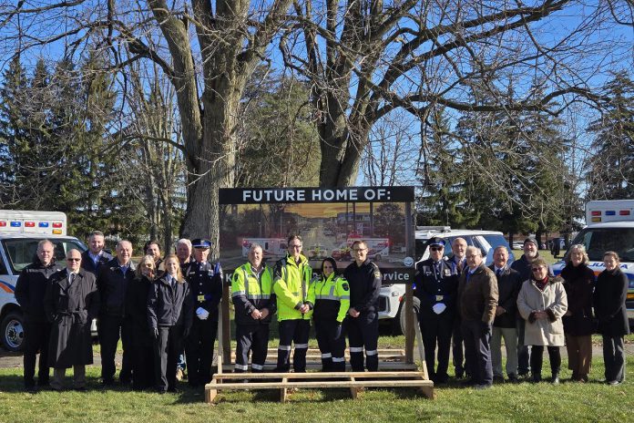 City of Kawartha Lakes politicians, staff, paramedics, and project partners gathered at 230 Angeline Street South in Lindsay on November 18, 2025 to mark the next step towards the construction of a new $50-million paramedics headquarters in Lindsay, unveiling a new sign to mark the site of the facility, with construction expected to begin in spring 2026 now that a lease agreement with Trillium Lakelands District School Board for the property has been finalized. (Photo: City of Kawartha Lakes)