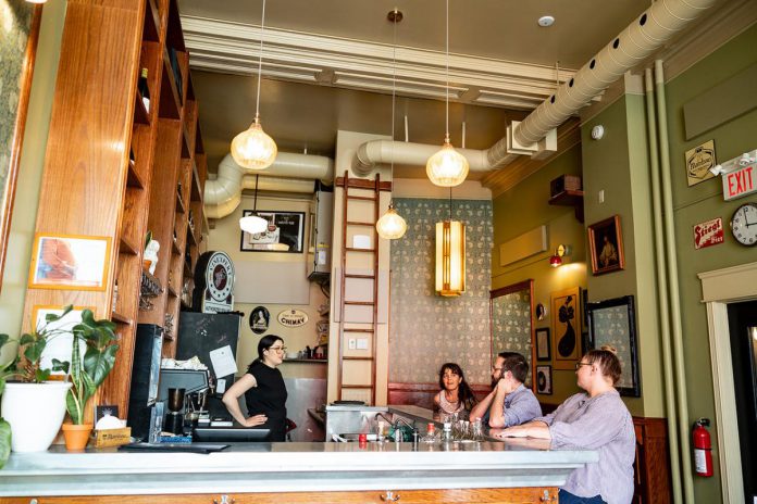 Shannon Mak behind the bar at Bijoux Bar, located adjacent to St Veronus Café & Tap Room in downtown Peterborough. In addition to serving the rare Belgian beer that can be found at St Veronus, Bijoux Bar also offers an extensive wine list, classic cocktails with an original twist, and light snacks. The bar can be rented out for private functions for a maximum capacity of 25 people between Monday and Saturday. (Photo courtesy of St Veronus)
