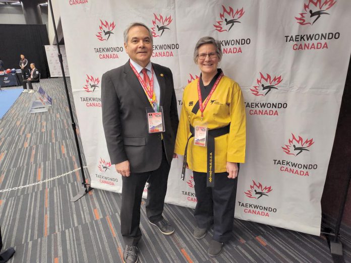 Linda Touzin stands with her coach Marcelo Sarkis of Blue Wave Taekwondo in Peterborough after earning a silver medal in the female over 65 poomsae category at the 2025 Canadian Taekwondo Nationals in Montréal in February 2025. Sarkis will be training Touzin as a member of the Taekwondo Ontario team at the 2026 Taekwondo Canada National Championships from February 5 to 7. (Photo courtesy of Blue Wave Taekwondo)
