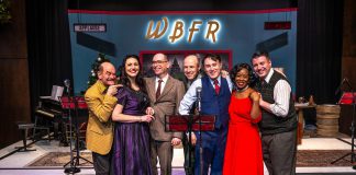 The entire original cast from New Stages Theatre's 2023 production of "It's a Wonderful Life: A Live Radio Show" will be reprising their roles when the show returns to Market Hall Performing Arts Centre in downtown Peterborough for six performances from December 10 to 14, 2025. From left to right: Brad Brackenridge, Megan Murphy, director Mark Wallace, Kerry Griffin, M. John Kennedy, Ordena Stephens-Thompson, and musical director Gabriel Vaillant. (Photo: Dahlia Katz)