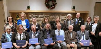 The Rotary Club of Peterborough and the Rotary Club of Peterborough-Kawartha jointly announced their 2025 Paul Harris Fellows during a dinner and celebration at the Peterborough Golf and Country Club on November 20, 2025. The Paul Harris Fellows in the front row, left to right, are Linda Calverley, Ashley Bonner, Lorne M. Hamilton, Marcus Ferguson, Steve Paul, and Len Lifchus, with Brendan Moher on behalf of Nine Ships 1825 Inc. receiving a certificate of appreciation (missing is Eric Steinmiller). Also pictured in the back row from left to right are Kelli Grady, Betty Halman-Plumley, Margaret Hamilton, Catherine Hanrahan, Wendy Swain, Elwood Jones, Don Watkins, Maureen Crowley, and Mary Smith. (Photo courtesy of Rotary Club of Peterborough)