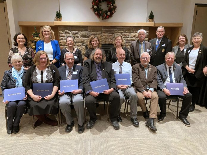 The Rotary Club of Peterborough and the Rotary Club of Peterborough-Kawartha jointly announced their 2025 Paul Harris Fellows during a dinner and celebration at the Peterborough Golf and Country Club on November 20, 2025. The Paul Harris Fellows in the front row, left to right, are Linda Calverley, Ashley Bonner, Lorne M. Hamilton, Marcus Ferguson, Steve Paul, and Len Lifchus, with Brendan Moher on behalf of Nine Ships 1825 Inc. receiving a certificate of appreciation (missing is Eric Steinmiller). Also pictured in the back row from left to right are Kelli Grady, Betty Halman-Plumley, Margaret Hamilton, Catherine Hanrahan, Wendy Swain, Elwood Jones, Don Watkins, Maureen Crowley, and Mary Smith. (Photo courtesy of Rotary Club of Peterborough)