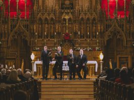 The Peterborough Symphony Orchestra (PSO) will be joined by Québécois vocal quartet Quartom (baritone Benoit Le Blanc, bass-baritone Philippe Martel, tenor Joé Lampron-Dandonneau, and baritone Julien Patenaude) for "Quartom Sings Noël," the PSO's annual holiday concert on December 6, 2025 at the Emmanuel United Church. The quartet will perform a mix of French versions of familiar Christmas carols, carols popular in Quebec, and English-language family favourites, with the orchestra also playing works by Russian composer Pyotr Ilyich Tchaikovsky, French composer Georges Bizet, and Canadian composer Ronald Royer. (Photo: Antoine Duguay)