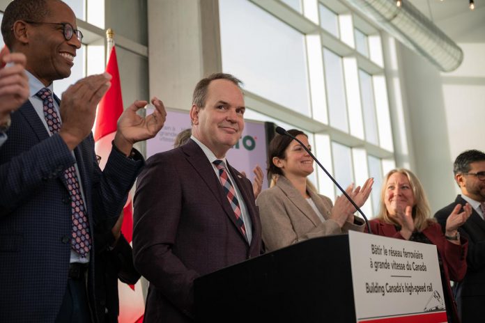 Federal transport minister Steven MacKinnon smiles after announcing the first segment of the Toronto–Québec City high-speed rail corridor will be constructed between Ottawa and Montreal during a media event announcement in Gatineau, Quebec on December 12, 2025. (Photo: Alto)