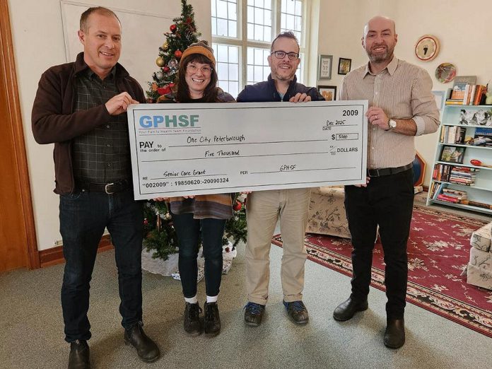 Greater Peterborough Health Services Foundation (GPHSF) executive director Vince Bierworth (far right) presents (left to right) One City Peterborough property development director Michael Vanderherberg, Trinity Community Centre drop-in program coordinator Cheyenne Buck, and One City Peterborough finance coordinator Brian McCarthy Finance with a cheque for $5,000 to help identify marginalized seniors with high nutritional needs that are not being met and provide interventions to offset their risk of associated health burdens. (Photo courtesy of GPHSF)