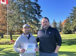Peterborough Golf and Country Club course superintendent Kevin Kobzan (left) and general manager Will Mitchell with their new Audubon Cooperative Sanctuary Program for Golf Courses certificate. This achievement required the club to undergo a rigorous, multi-year process detailing how they care for the property's ecosystems and sustainably manage their turf. (Photo: Jackie Donaldson / GreenUP)