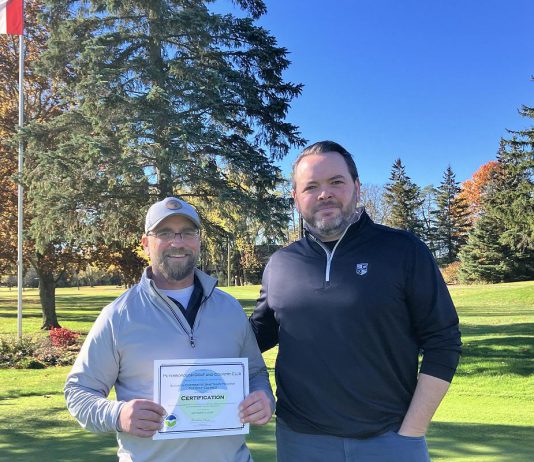Peterborough Golf and Country Club course superintendent Kevin Kobzan (left) and general manager Will Mitchell with their new Audubon Cooperative Sanctuary Program for Golf Courses certificate. This achievement required the club to undergo a rigorous, multi-year process detailing how they care for the property's ecosystems and sustainably manage their turf. (Photo: Jackie Donaldson / GreenUP)