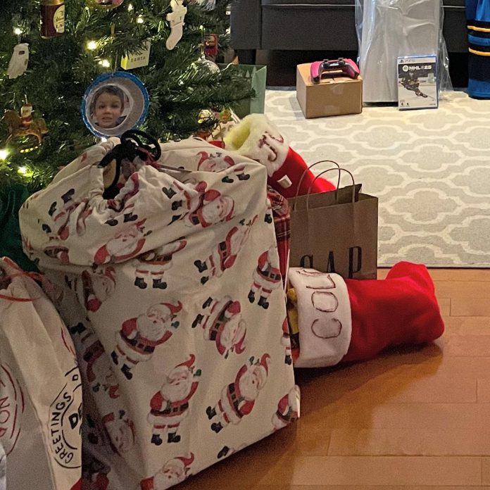 Large fabric bags, also known as "Santa sacks," hold multiple unwrapped presents and are a reusable alternative to laminated bags that are not recyclable. It also takes much less time than wrapping gifts individually. (Photo: Marlo Stimpson)