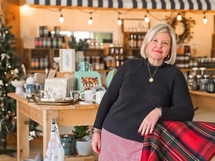 Alicia Doris, owner of the award-winning Living Local Marketplace in Peterborough, has set up a Christmas Marketplace at Horlings Garden Centre in Selwyn until December 22, 2025. The boutique shop's home for the holidays offers a wide range of products from Canadian artisans and small businesses while crafting a holiday experience that includes beautiful Christmas displays, hot cider and cookies while you shop, and gift wrapping services, with both customizable and ready-made gift boxes available, including for corporate gifting. (Photo: Amy Zand / Elmwood & Baker) Alicia Doris, owner of the award-winning Living Local Marketplace in Peterborough, has set up a Christmas Marketplace at Horlings Garden Centre in Selwyn until December 22, 2025. The boutique shop's home for the holidays offers a wide range of products from Canadian artisans and small businesses while crafting a holiday experience that includes beautiful Christmas displays, hot cider and cookies while you shop, and gift wrapping services, with both customizable and ready-made gift boxes available, including for corporate gifting. (Photo: Amy Zand / Elmwood & Baker)