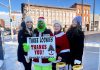 Even The Grinch is volunteering during "Loonies on the Street" on December 12, 2025 just outside of Peterborough Square at the corner of George and Simcoe Streets in downtown Peterborough. The 25th annual fundraiser to help keep the shelves stocked at Kawartha Food Share aims to raise at least $100,000 that will help feed over 14,000 people each month in the Peterborough area. (Photo: Kawartha Food Share)