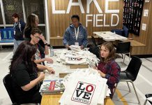 During the weekly gym nights hosted by the Lakefield Youth Unlimited, youth have been putting price tags on "Love Lakefield" tote bags and including "Love Lakefield" magnets created by a local artist. The tote bags, each with a magnet, are being sold for $20 each in support of the non-profit organization's annual Christmas gift card drive for families in need. Originally designed 10 years ago, the logo found a second life following the October fire that destroyed the Kawartha Home Hardware building, including the upper-level apartments. (Photo: Lakefield Youth Unlimited)
