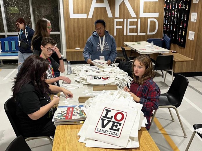 During the weekly gym nights hosted by the Lakefield Youth Unlimited, youth have been putting price tags on "Love Lakefield" tote bags and including "Love Lakefield" magnets created by a local artist. The tote bags, each with a magnet, are being sold for $20 each in support of the non-profit organization's annual Christmas gift card drive for families in need. Originally designed 10 years ago, the logo found a second life following the October fire that destroyed the Kawartha Home Hardware building, including the upper-level apartments. (Photo: Lakefield Youth Unlimited) During the weekly gym nights hosted by the Lakefield Youth Unlimited, youth have been putting price tags on "Love Lakefield" tote bags and including "Love Lakefield" magnets created by a local artist. The tote bags, each with a magnet, are being sold for $20 each in support of the non-profit organization's annual Christmas gift card drive for families in need. Originally designed 10 years ago, the logo found a second life following the October fire that destroyed the Kawartha Home Hardware building, including the upper-level apartments. (Photo: Lakefield Youth Unlimited)
